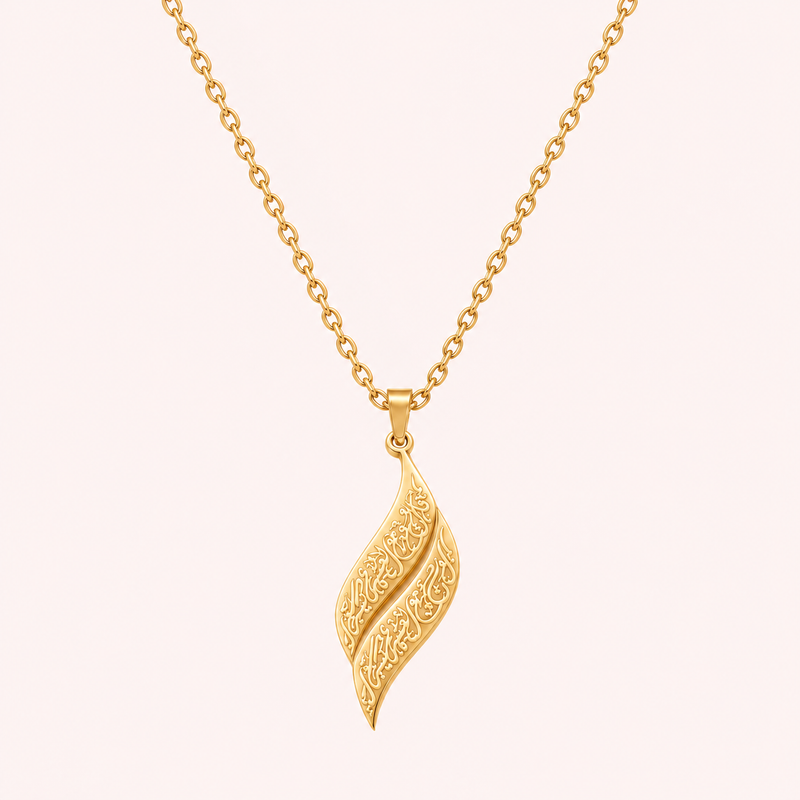 Calligraphy leaf necklace in 18k gold, engraved twisted pendant on a fine chain