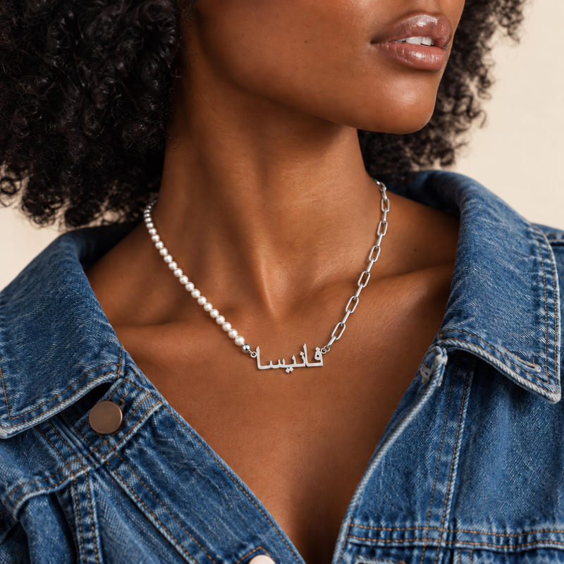 Pearl and paperclip name necklace worn with denim, silver