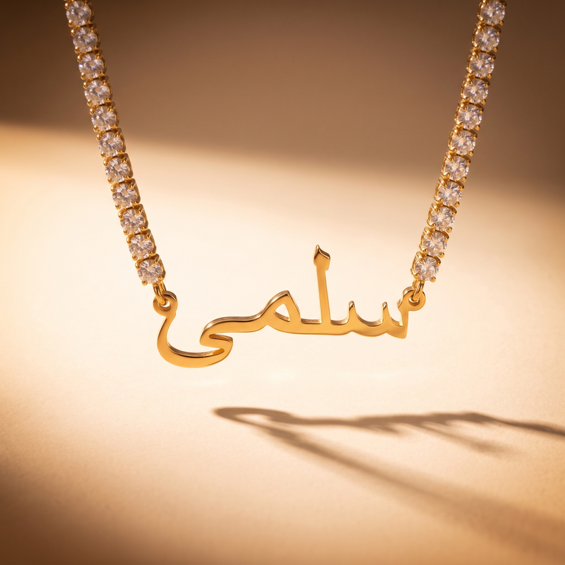 Arabic zircon name necklace hanging, showing the tennis chain