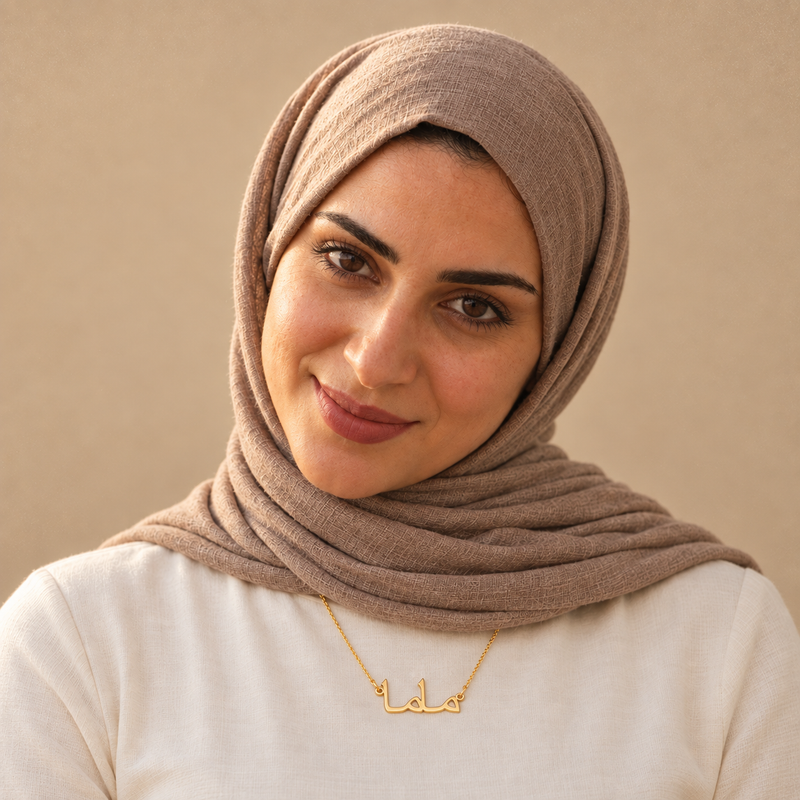 Mama necklace worn, gold Arabic pendant
