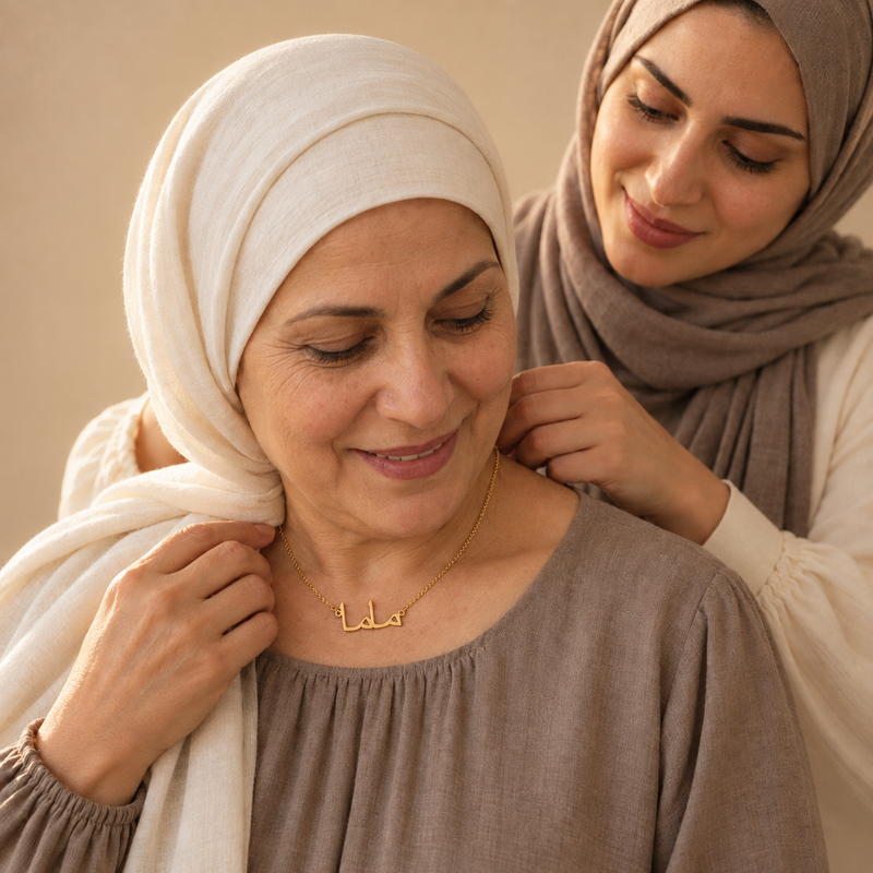 Mama necklace, a daughter fastening it on her mother