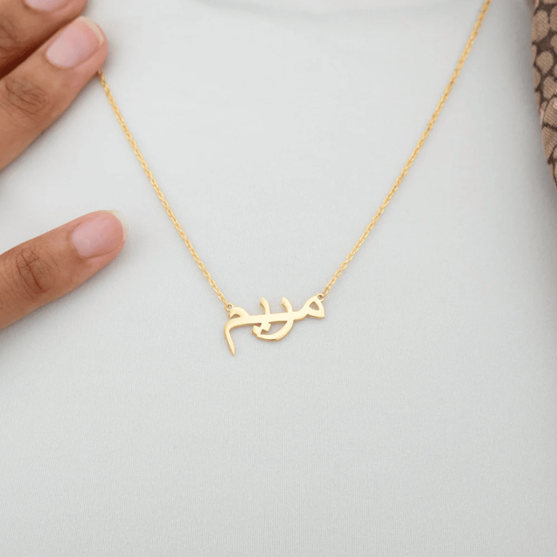 NQ advertorial pendant fingers
