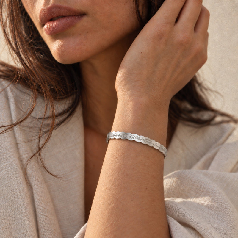 Ripple Calligraphy Cuff worn in silver