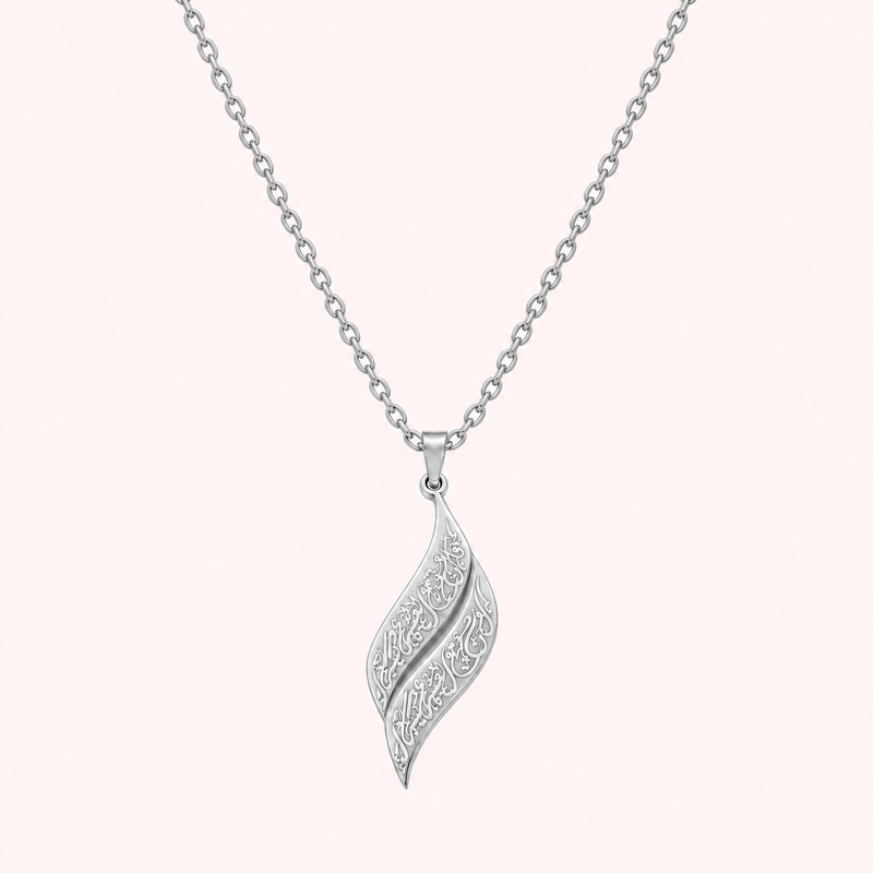 Calligraphy leaf necklace in silver, engraved twisted pendant on a fine chain