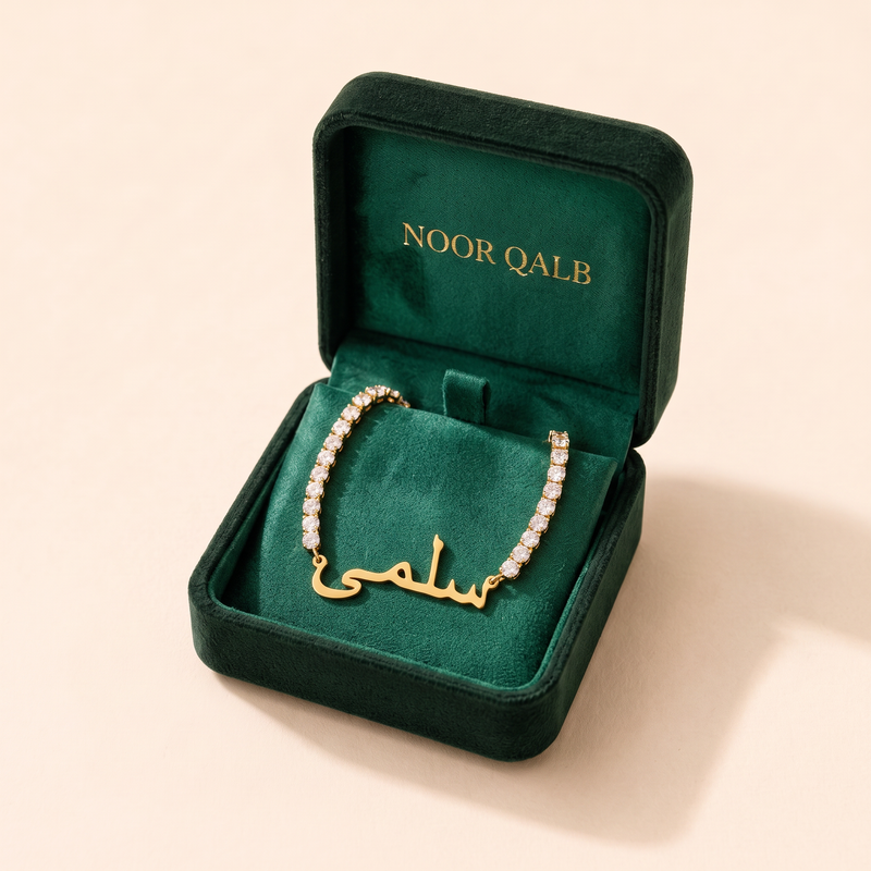 Arabic zircon name necklace in its Noor Qalb velvet gift box