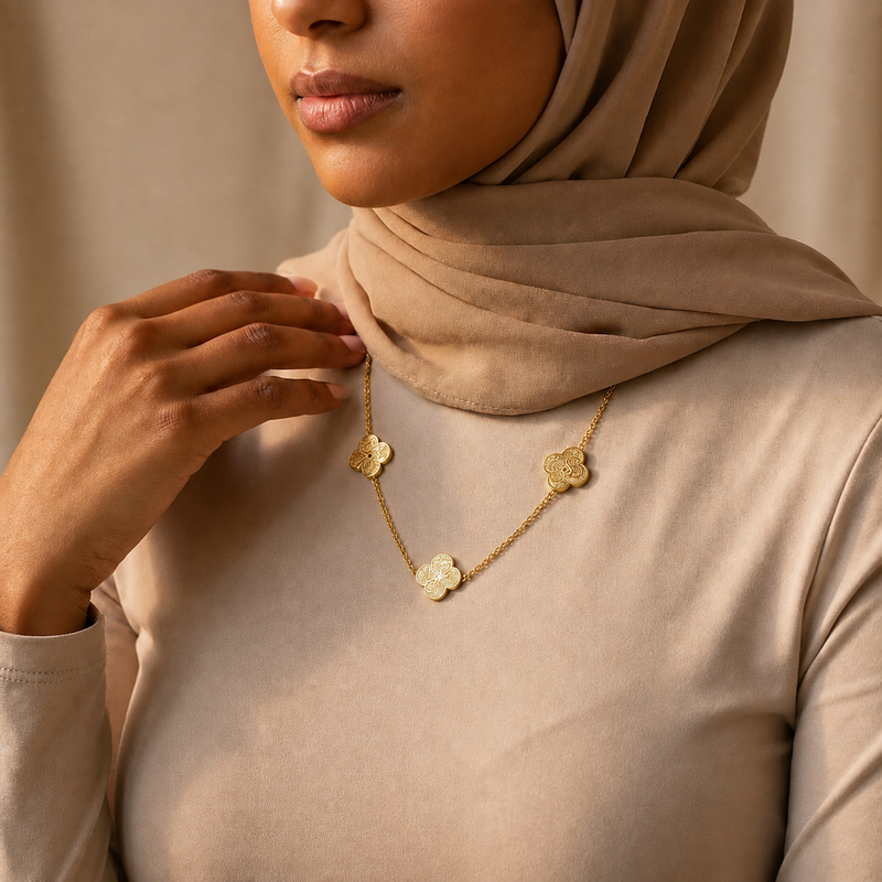 Rawdat Al-Qalb Trio Necklace worn, gold