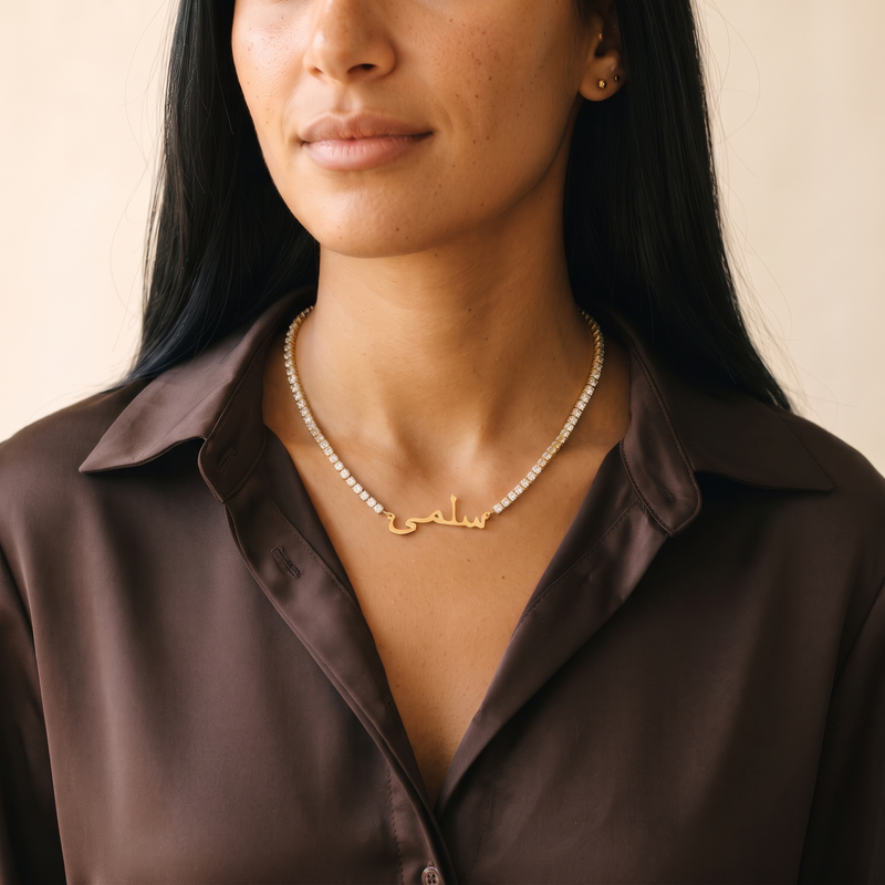 Arabic zircon name necklace worn, front view