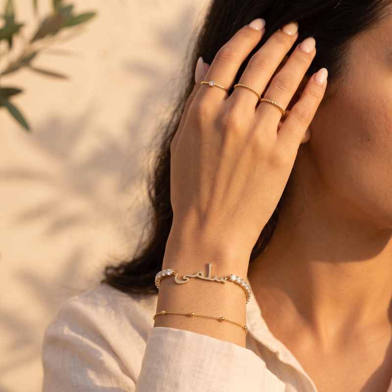 Arabic zircon name bracelet worn, golden hour