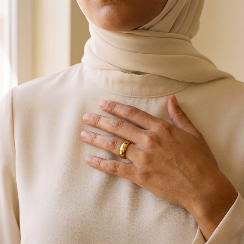 Noor Essential Ring worn, hand at the chest