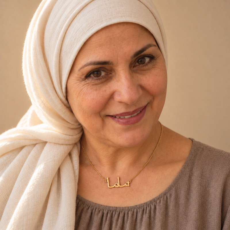 Mama necklace worn by a mother, gold Arabic pendant