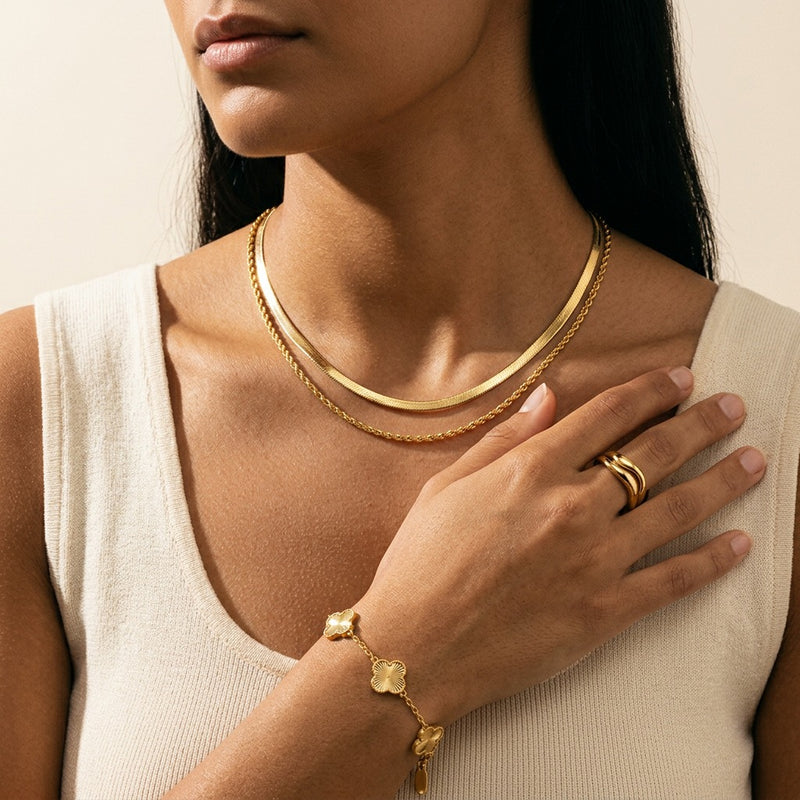 Noor Luna Chain and Noor Unity Ring worn - layered herringbone and rope chain