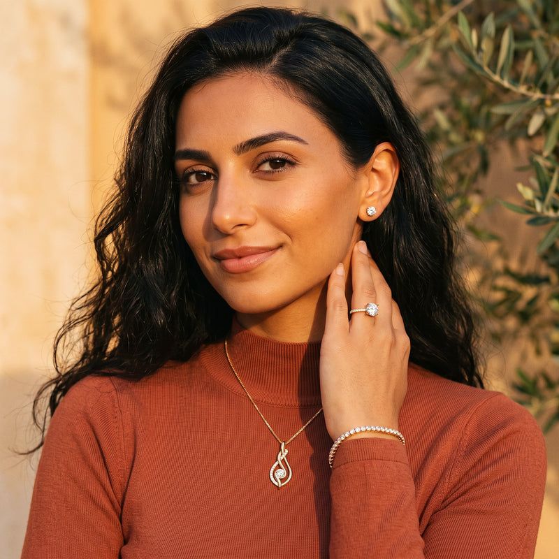 The Noor Moissanite Set worn - studs, pendant, solitaire ring and tennis bracelet together