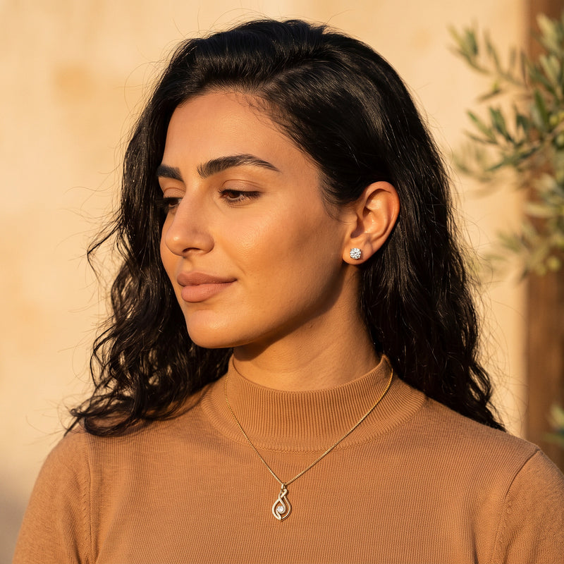 Rania Moissanite Studs and Diya Al-Noor Pendant worn