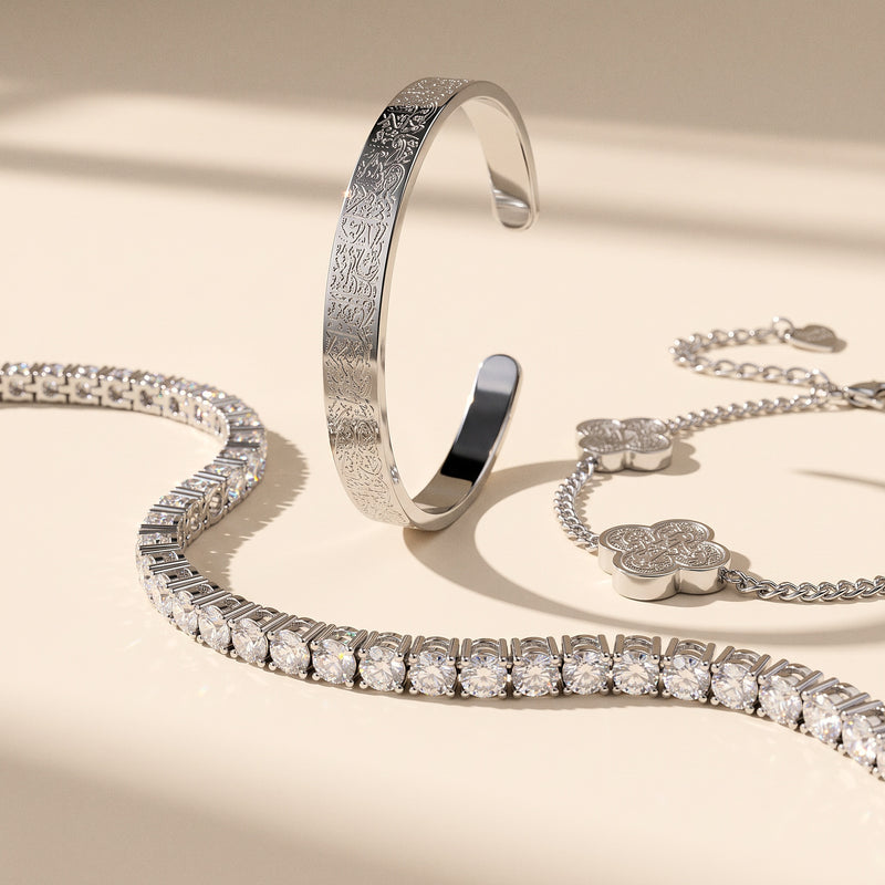 The Noor Radiance Stack in silver - moissanite tennis bracelet, Ayatul Kursi cuff and clover bracelet