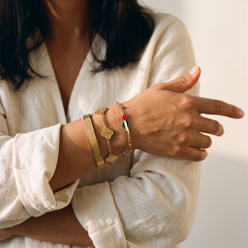 The Noor Signature Stack worn - three bracelets stacked on the wrist