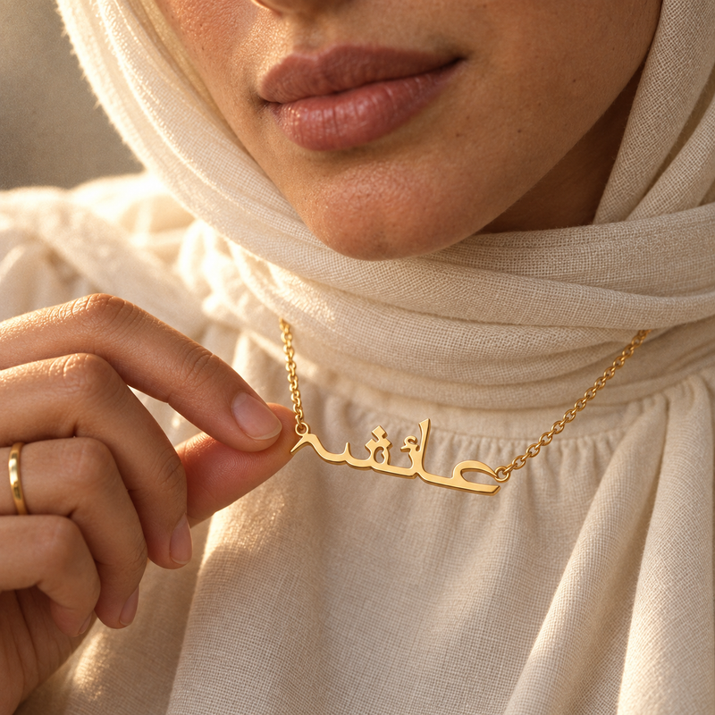 Urdu name necklace worn, gold Urdu calligraphy pendant