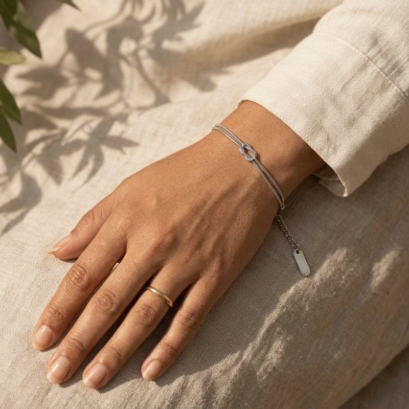 Wisal Knot Bracelet worn on the wrist - Silver finish