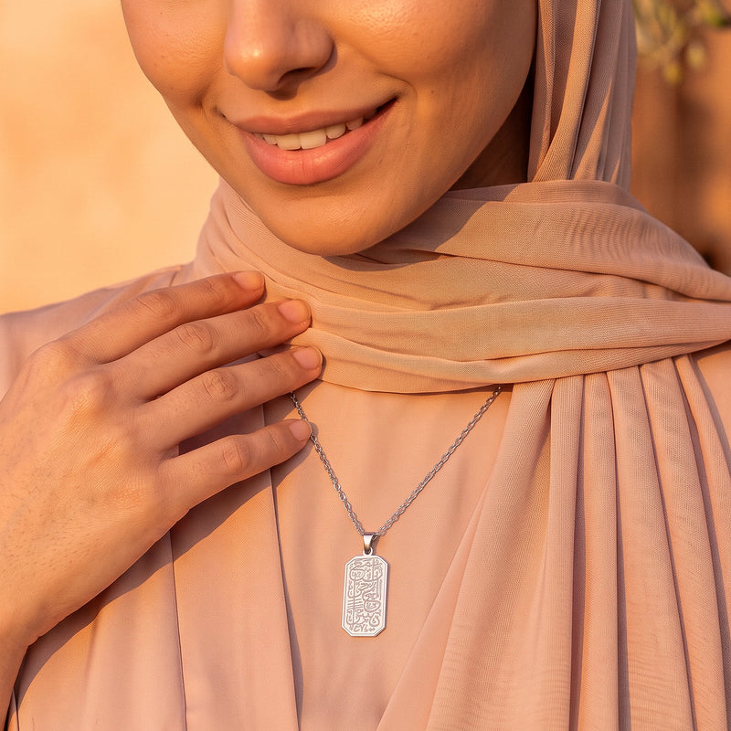 Silver Yusra Pendant, Inna ma'a al-usri yusra, worn close to the heart